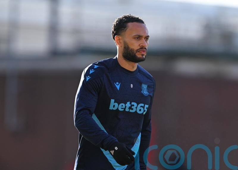 Mark Robins seals first home win as Stoke boss in comeback victory over Swansea
