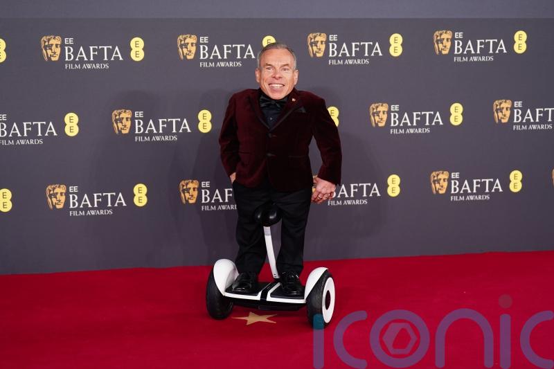 Warwick Davis found out about his Bafta fellowship award while ‘on the toilet’