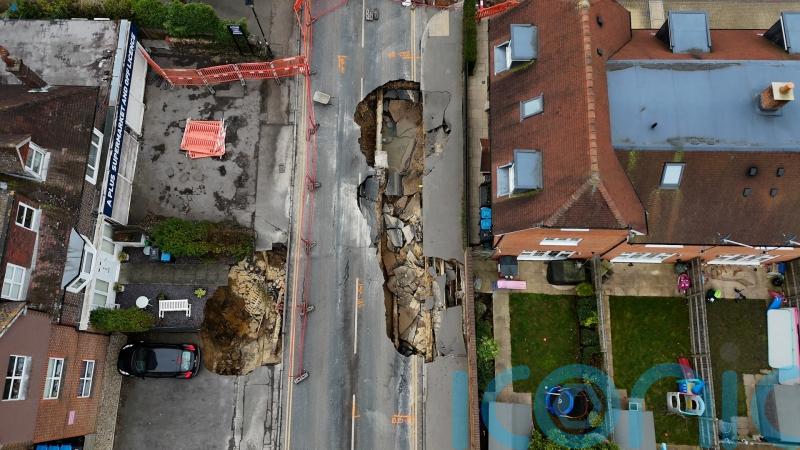 Investigations continue after sinkhole shuts Surrey street