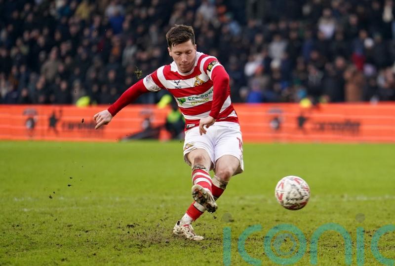 Doncaster boost bid for automatic promotion with narrow win at Accrington