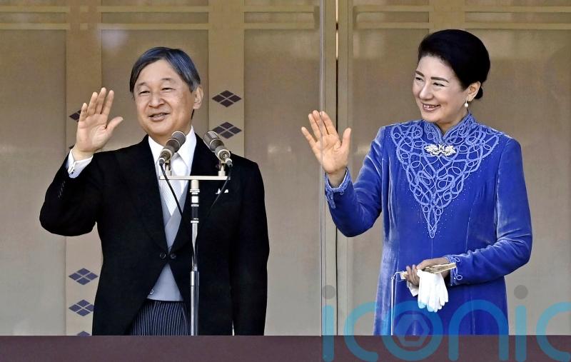 Japan’s emperor marks 65th birthday saying tragedy of war must be remembered