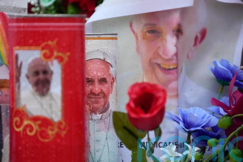 Pope Francis shows slight improvement and resumes some work, Vatican says