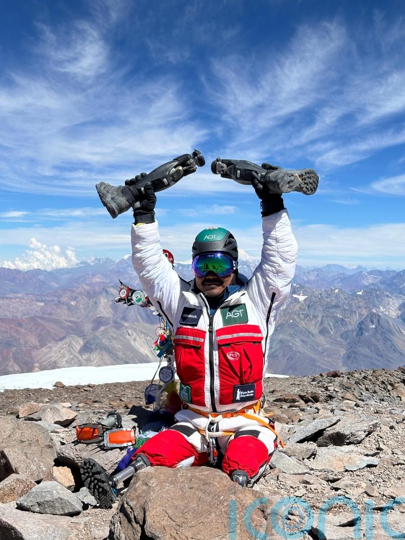 Double-amputee mountaineer climbs tallest mountain in southern hemisphere