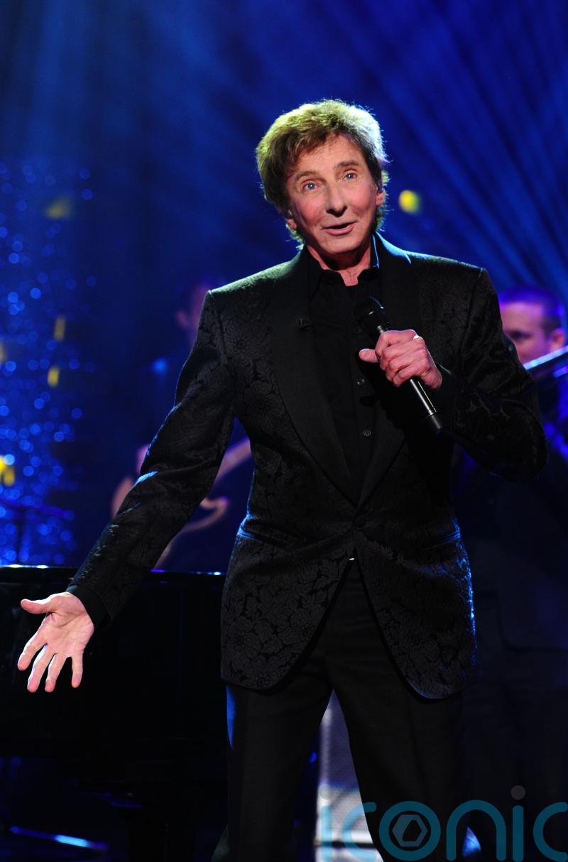Part of claim against Barry Manilow to be paused in England, judge rules