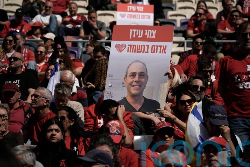 Mourners bury one of last hostages released from Gaza amid talks on ceasefire