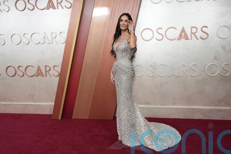 Demi Moore leads metallics trend on Oscars red carpet