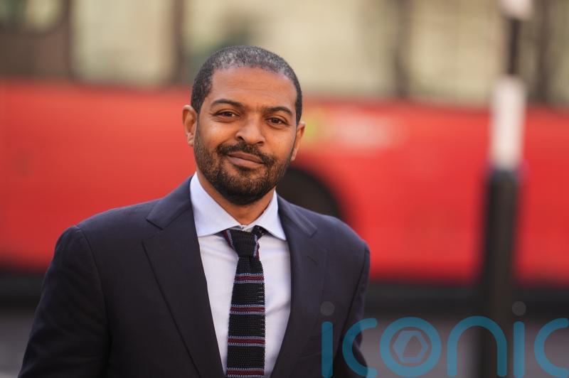 Noel Clarke attends planned start of libel trial against Guardian publisher