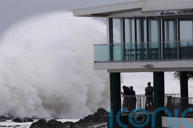 Schools closed as rare cyclone approaches Australia’s eastern coast