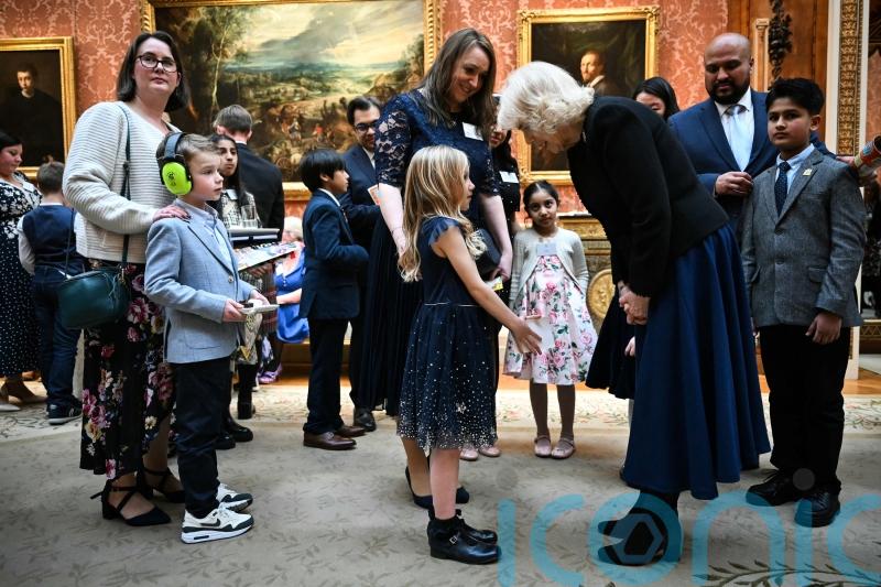 Queen praises ‘writers of future’ as she presents prizes for BBC competition