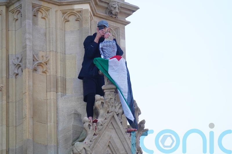 Parliamentary tours cancelled as man remains metres up Elizabeth Tower