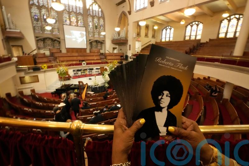 Stevie Wonder and the Rev Al Sharpton feature at Roberta Flack memorial