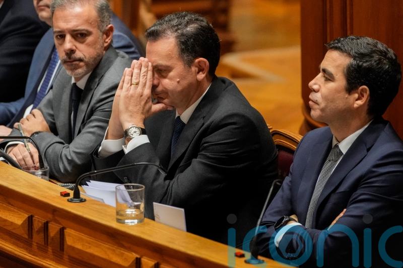 Portugal’s minority government loses confidence vote, triggering early election