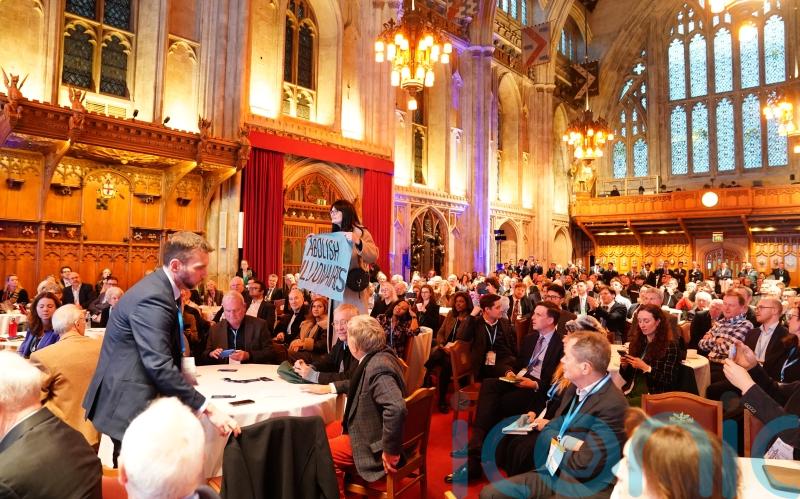 Climate protesters interrupt Kemi Badenoch’s speech at Thatcher conference