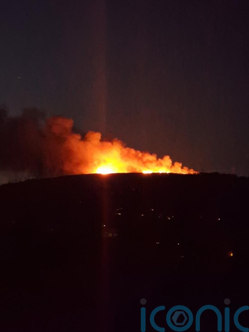 Firefighters tackle wildfires visible for miles across Welsh countryside