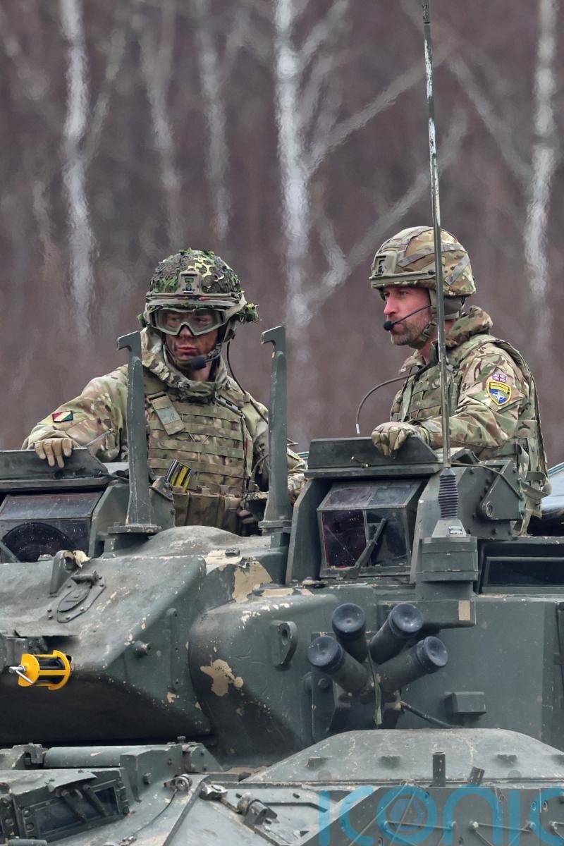 Prince of Wales meets troops on visit to military base in Estonia