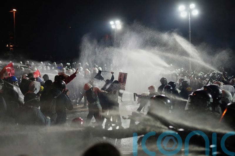 Turkey detains journalists as protests grow over jailing of Erdogan rival