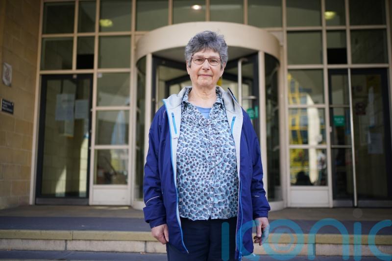 Retired GP who obstructed railway during power station protest avoids jail