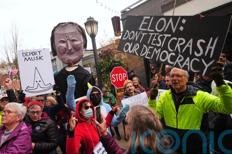 Anti-Musk protesters aiming to ‘take down Tesla’ gather outside dealerships