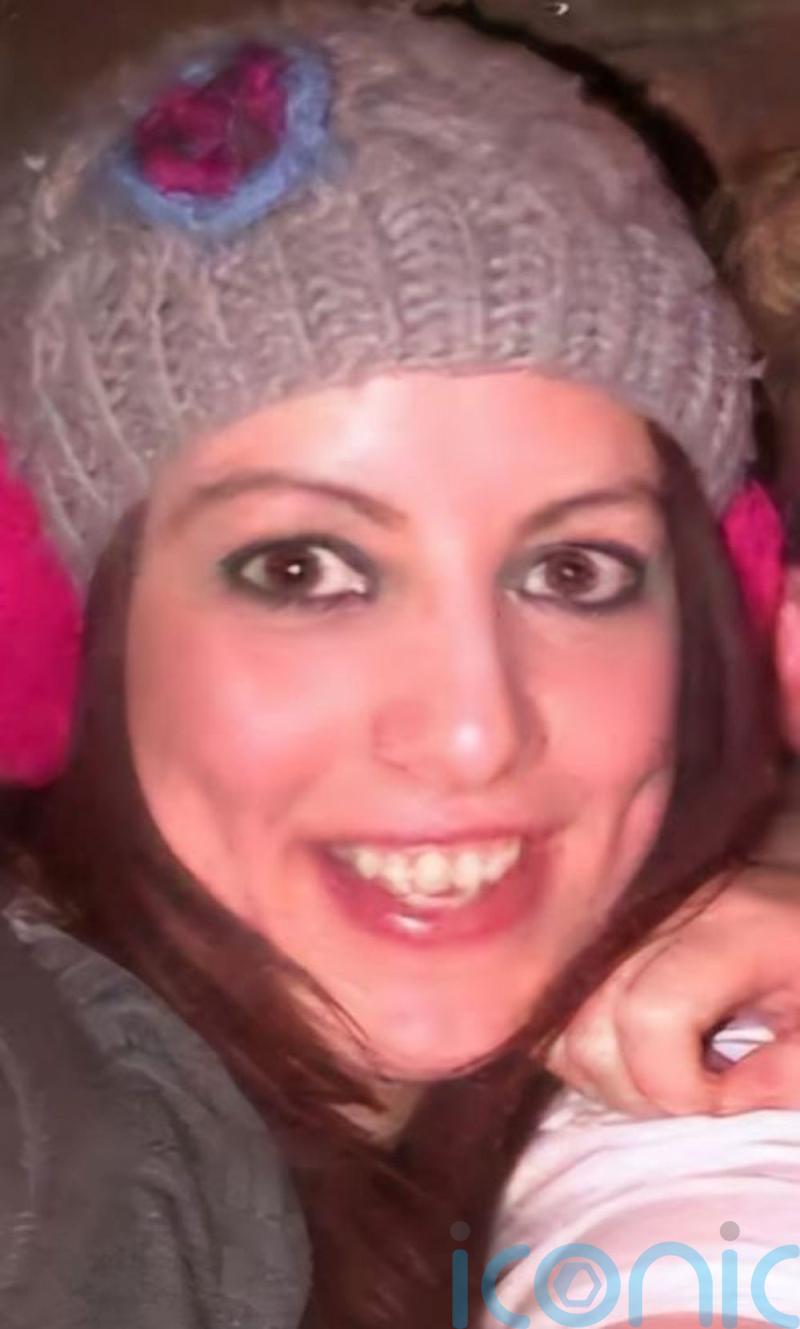 Woman identified a year after body found in river