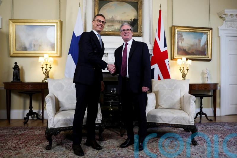 UK and Finland ‘tied hip-to-hip’ on Nato, says Finnish president in No 10 visit