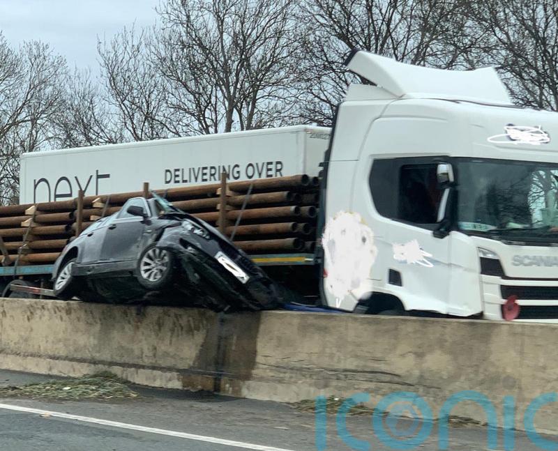 Car dragged 100 metres down central reservation but only minor injuries caused