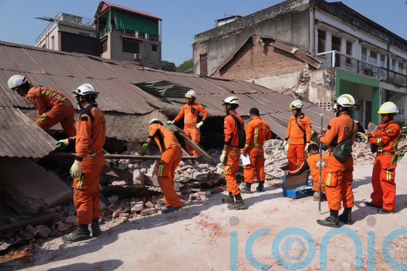 Woman pulled alive from collapsed building 91 hours after earthquake