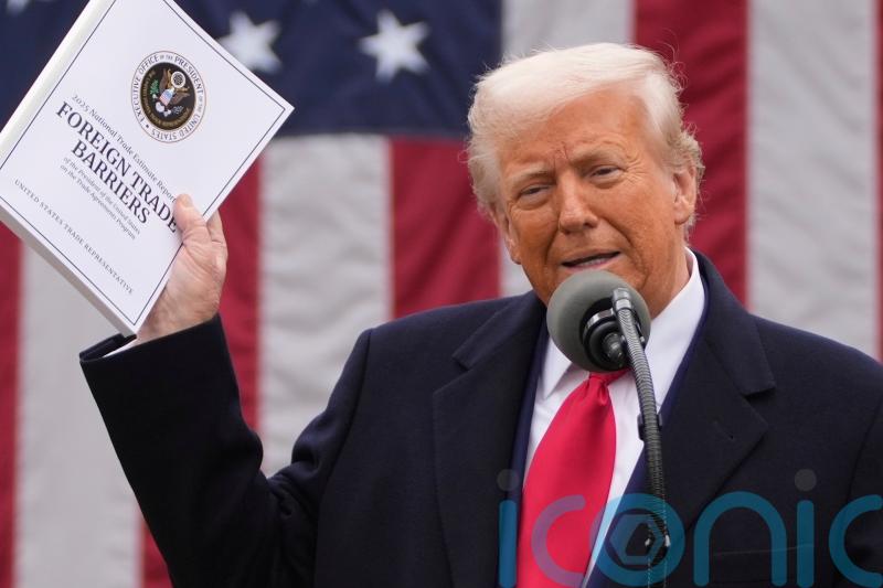 World reacts with caution to Trump’s tariffs