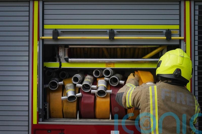 Firefighters tackle wildfire with flames two metres high