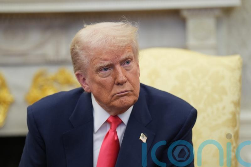 Trump ordered to pay more than £625,000 costs over sex dossier legal claim