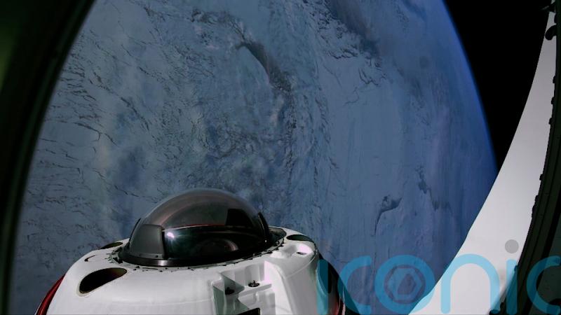 Space tourists return to Earth after private flight over the poles
