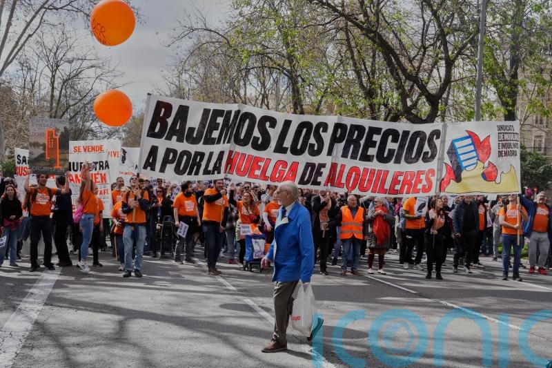 Spaniards march across dozens of cities in protest over growing housing crisis