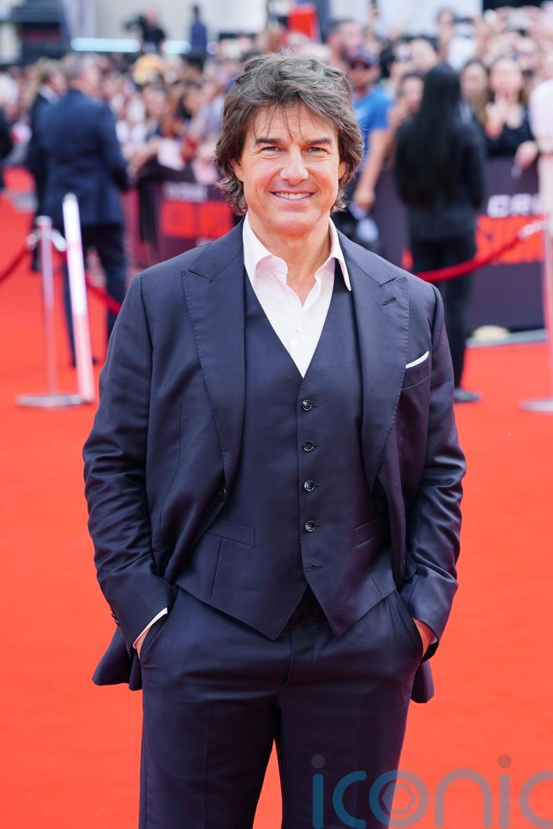 Tom Cruise hangs off moving planes in new Mission: Impossible trailer