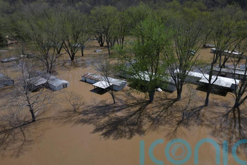 Swollen rivers flood towns in southern US after prolonged deluge