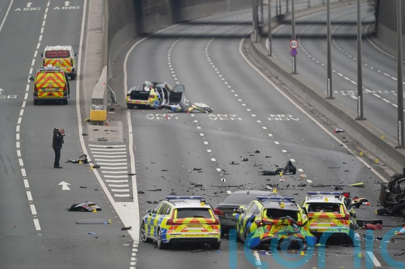 Police vehicles badly damaged in major collision which shut the A1