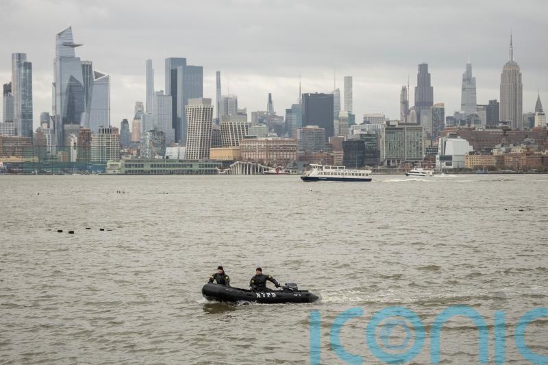 Divers search Hudson River for parts of helicopter after crash