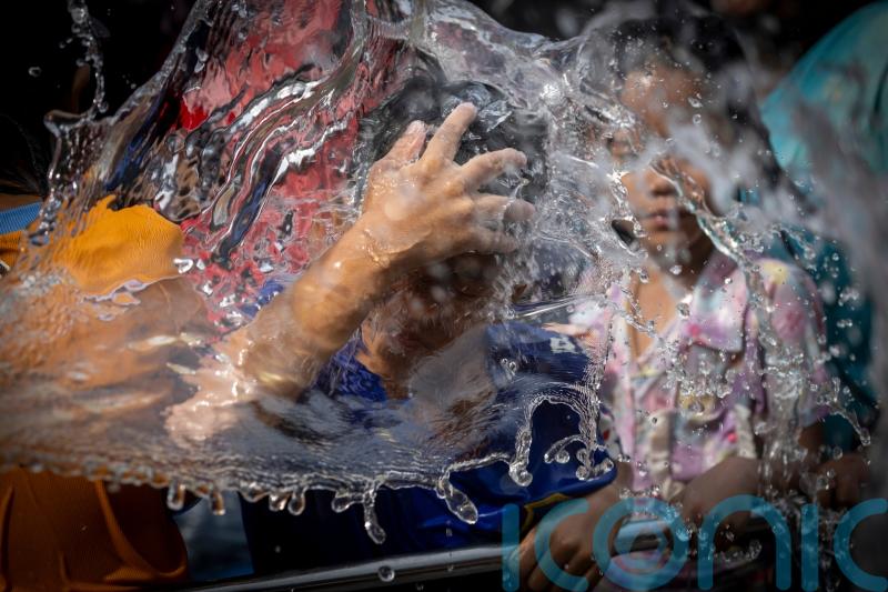 Quake recovery subdues water festival celebrations in Myanmar