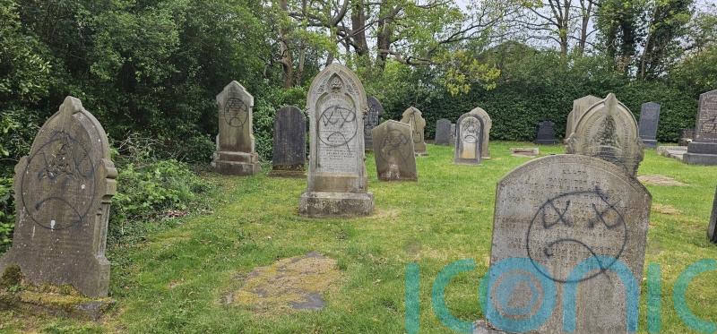 Vandalised church hides graffiti with plants to host wedding