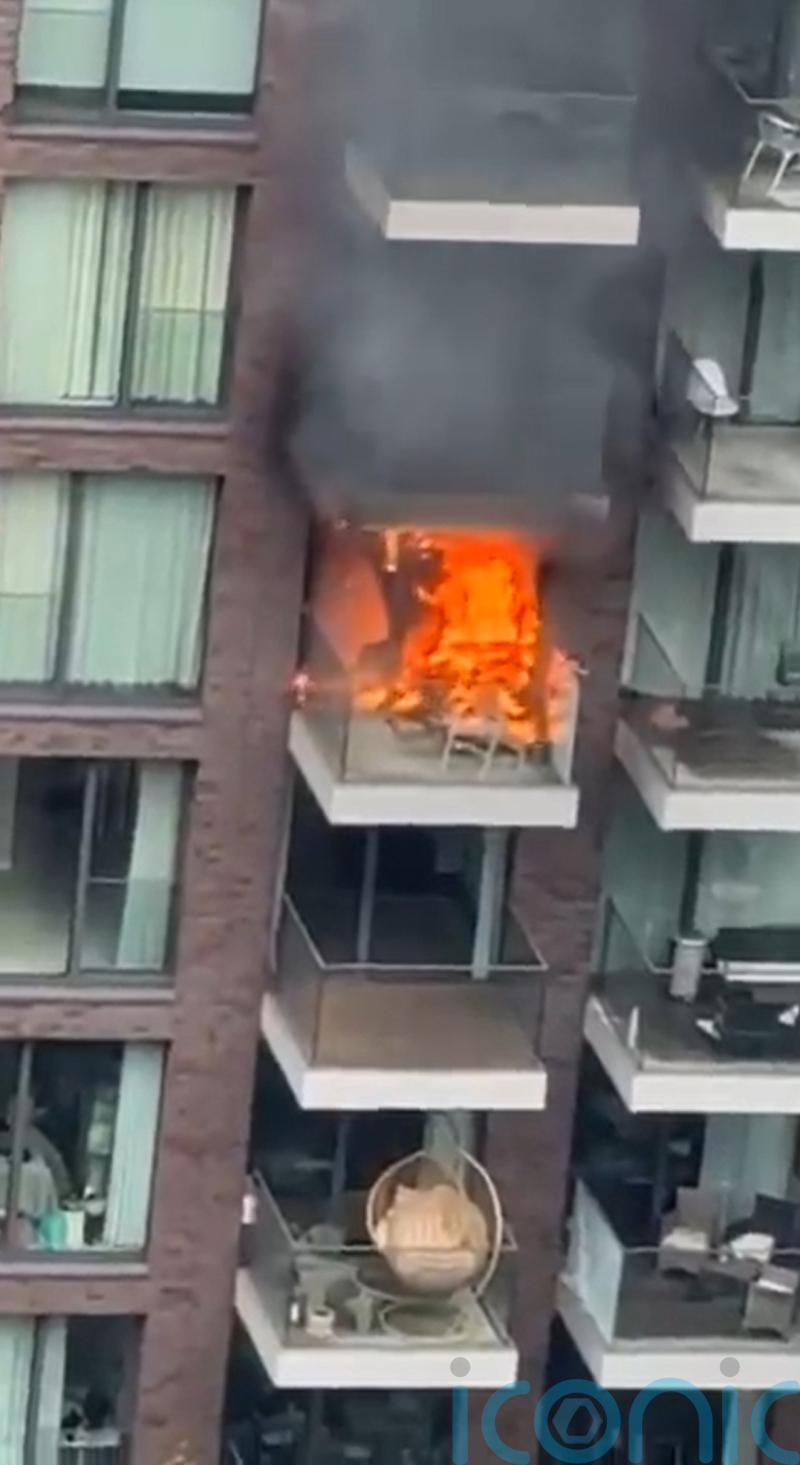 Fire at block of flats tackled by 100 firefighters