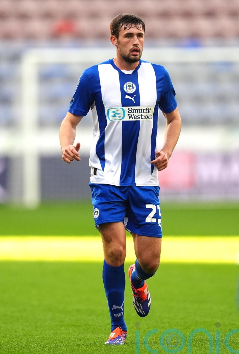 James Carragher nets Wigan winner against Rotherham to secure survival