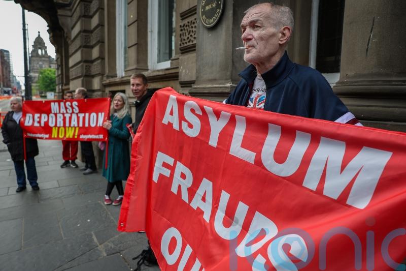Protesters gather as Swinney chairs special summit to tackle far right