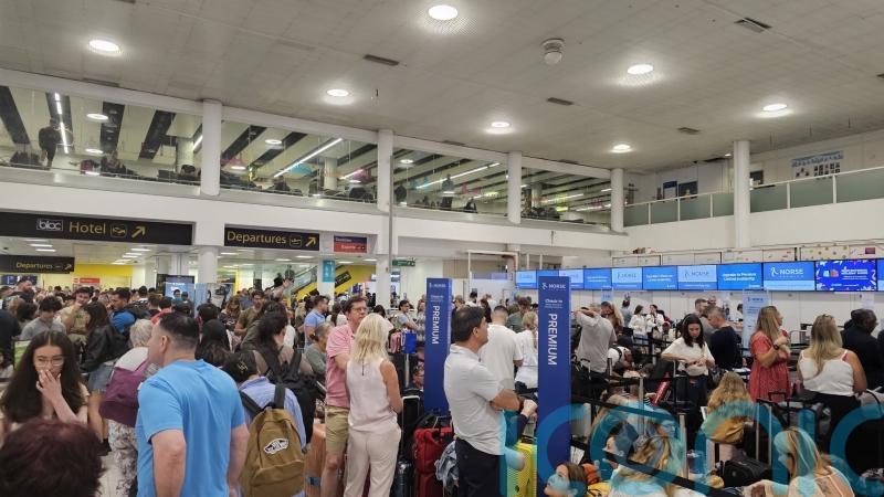 Airports and rail firms affected as IT outage causes transport chaos