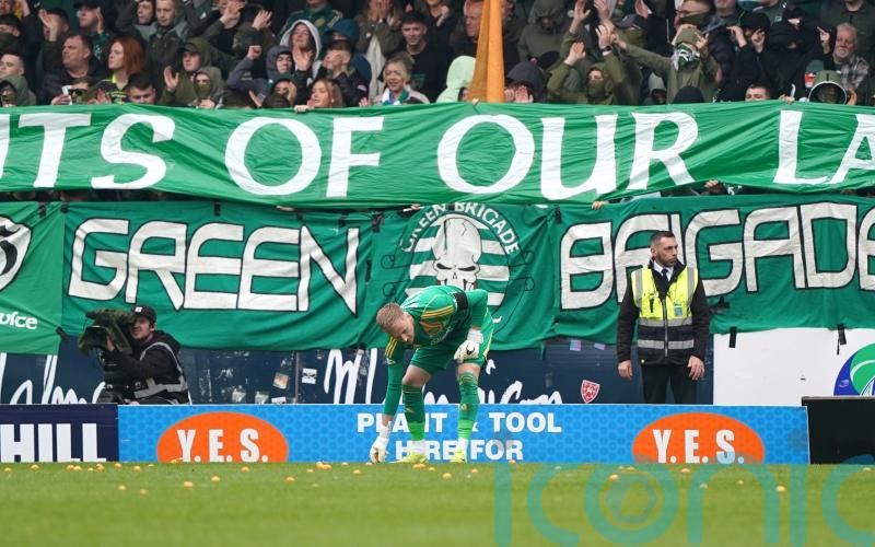 Celtic fans halt Dundee United match with tangerines protest over ticket prices