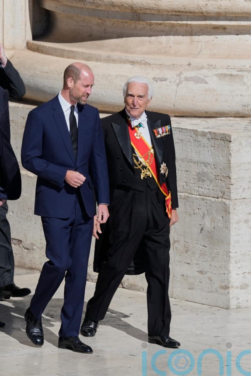 William pays respects to Pope on behalf of King at historic funeral