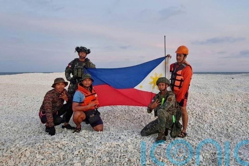 China and Philippines use flags to stake competing claims in South China Sea