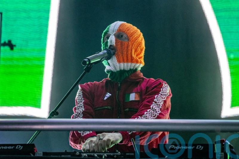 Kneecap apologises to families of murdered MPs after concert video clip furore