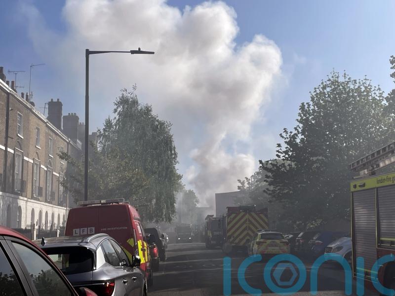 Flats evacuated as 100 firefighters tackle substation blaze in west London