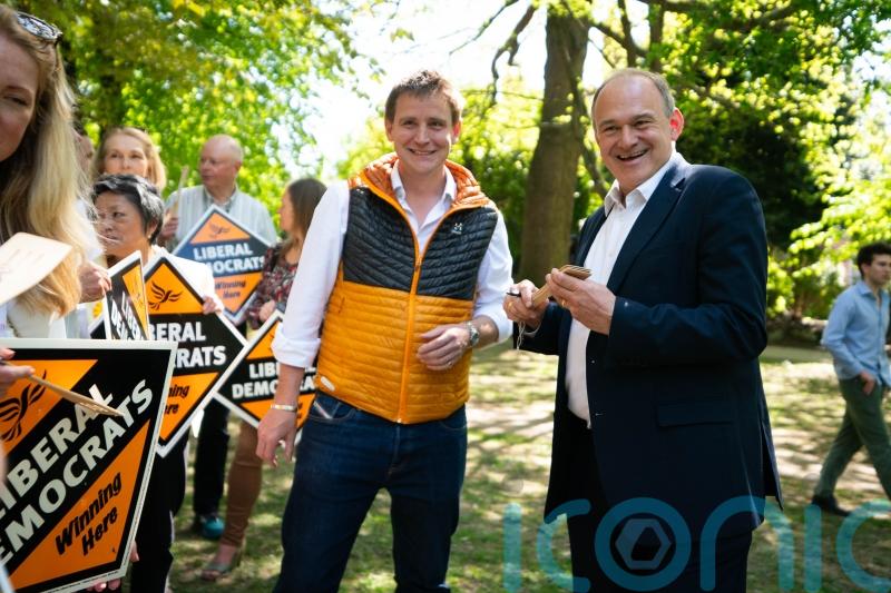 Sir Ed Davey signs ‘magic spatulas’ during local election visit