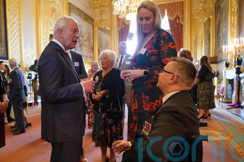 Prince of Wales says he is ‘in awe’ of triple-amputee veteran injured in Iraq