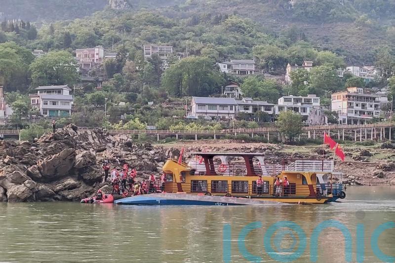 At least three people dead after Chinese tourist boats capsize during storm