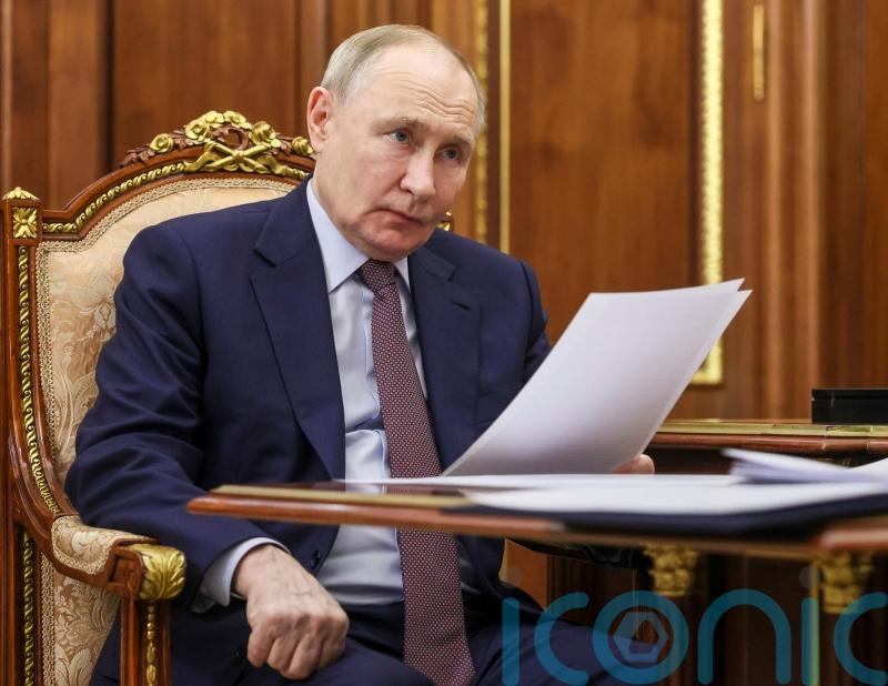 Russia says Putin will travel to China in August